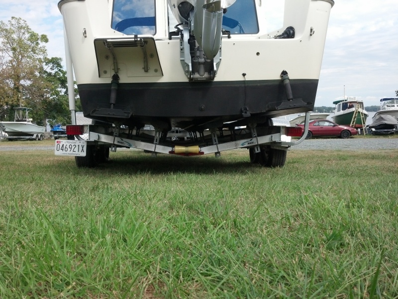 Off center loading even with dock hand help. Solved with custom side rails.