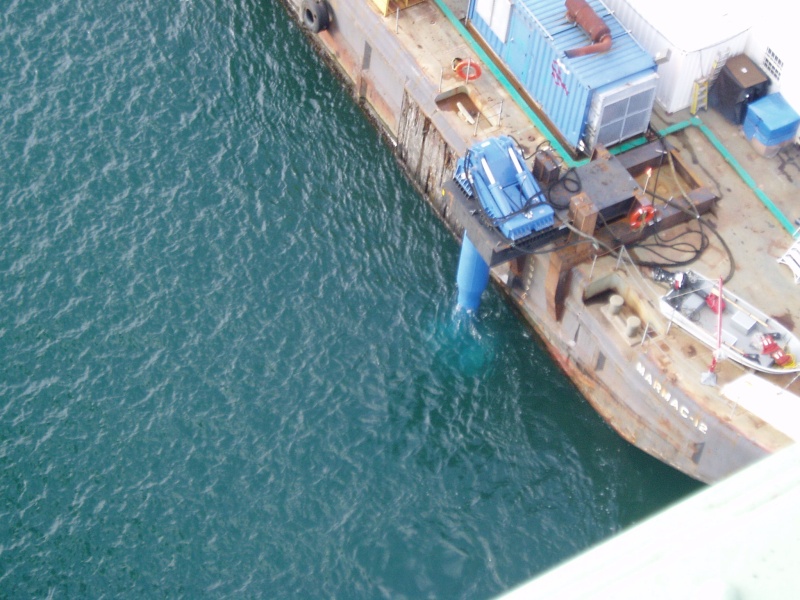One of four 450 HP truster motors powering barge controlled by GPS system.