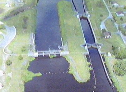 Ortona Lock: Lock chamber:50'x250'- Vertical lift: 7.5' to 8.5'- Discharge capacity 8,600 cfs(cubic feet per second)Operates daily 6:00A to 9:30P-Marine VHF radio Channel 13-Located at Okeechobee Waterway 
statute mile 93.5