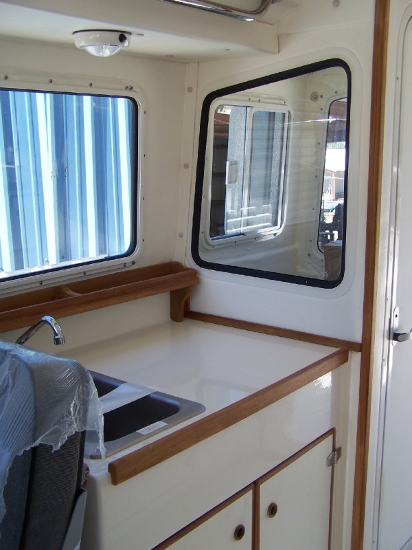 Our new 2009 Tomcat 255 "Destiny" at Wefings Marine in Eastpoint, Florida September 2009 - starboard counter - stove to be added