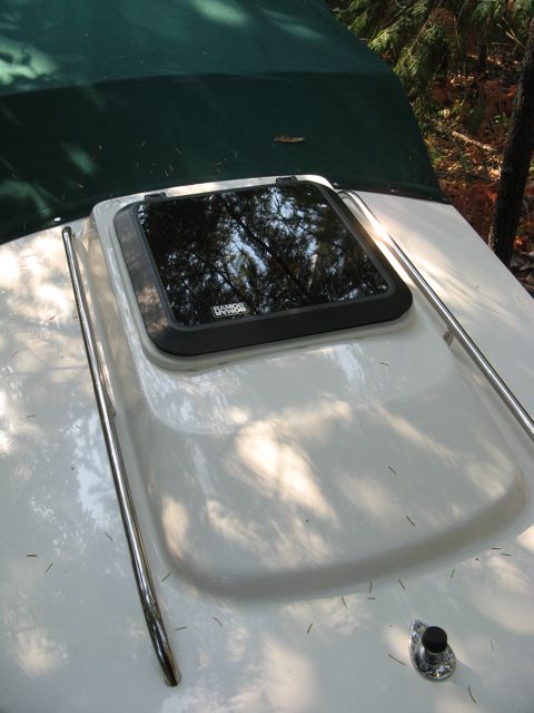 Overhead hatch added to cabin-- outside view. Bowmar 900 series 16" model. Camperback is shown behind hatch.
