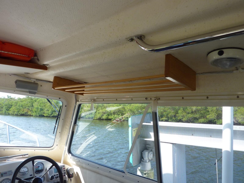 Overhead storage glued to ceiling.