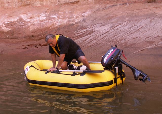 Pat Getting in Dinghy with Baxter at Twilight Canyon 9-20-08
