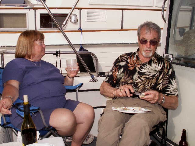 Patty and Barry in Cockpit at Coal Harbor 6-6-09.Sized