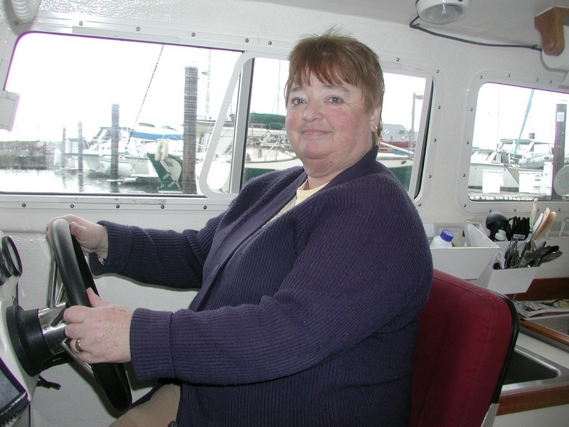 Patty at Helm - First Birthday Cruise - 2-14-04