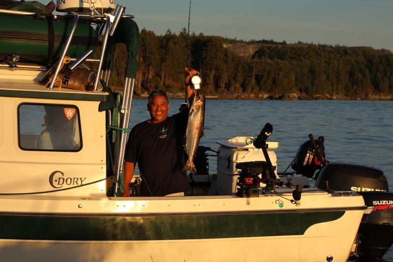 Peter on C-Dancer from Washington caught a salmon - happy boy!