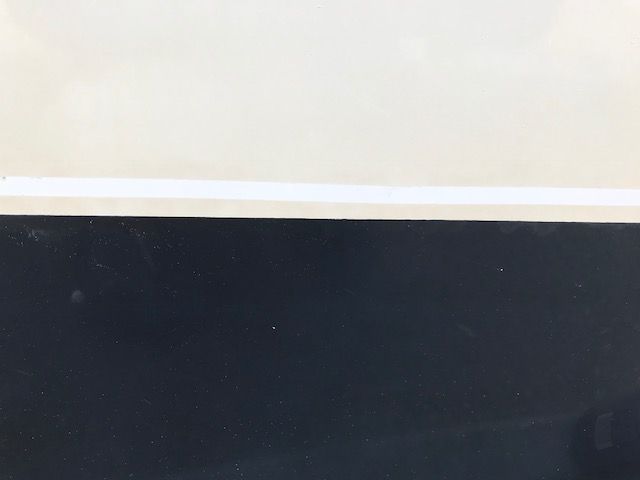 Pinstripe gone.  Wow...the gelcoat yellowed.