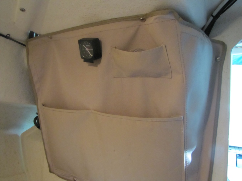 Pockets for two books, etc added to electrical cover in V-Berth.