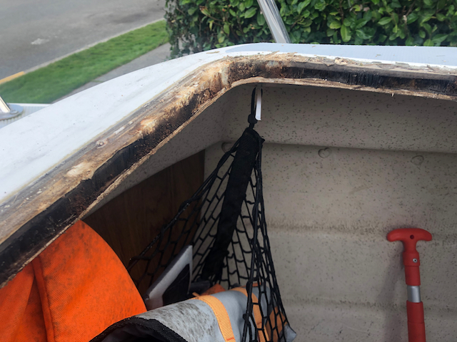 Pulled the hatch. Water damage and infiltration apparent around all edges of the hatch opening.