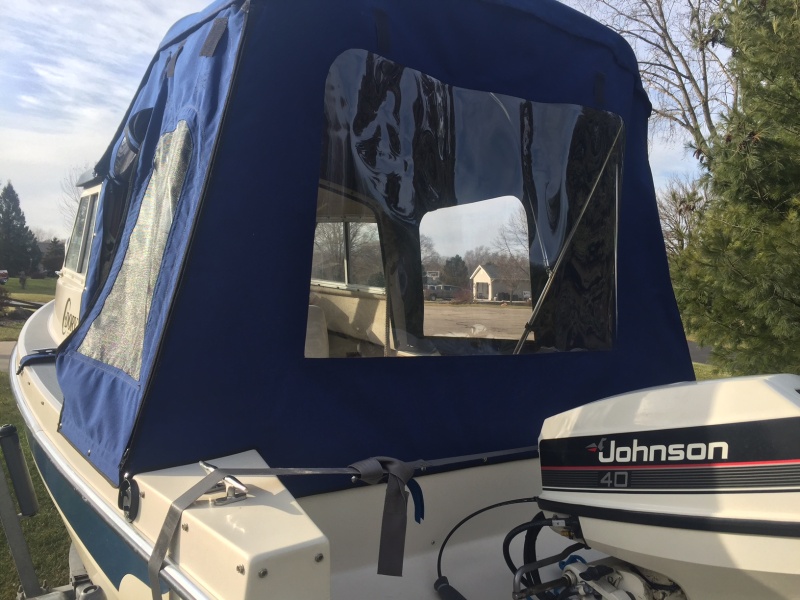 Rear window panel installed and can be rolled up.