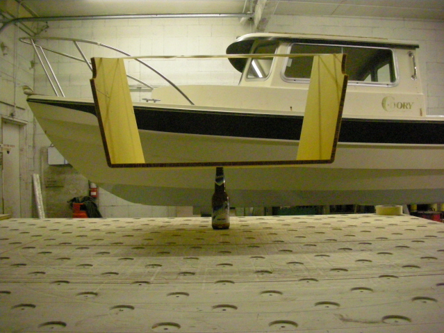 right now the whole thing only wieghs maybe 2 pounds, after fairing and glassing and paint it will probly wiegh around 13 pounds, much less than the one i cut out