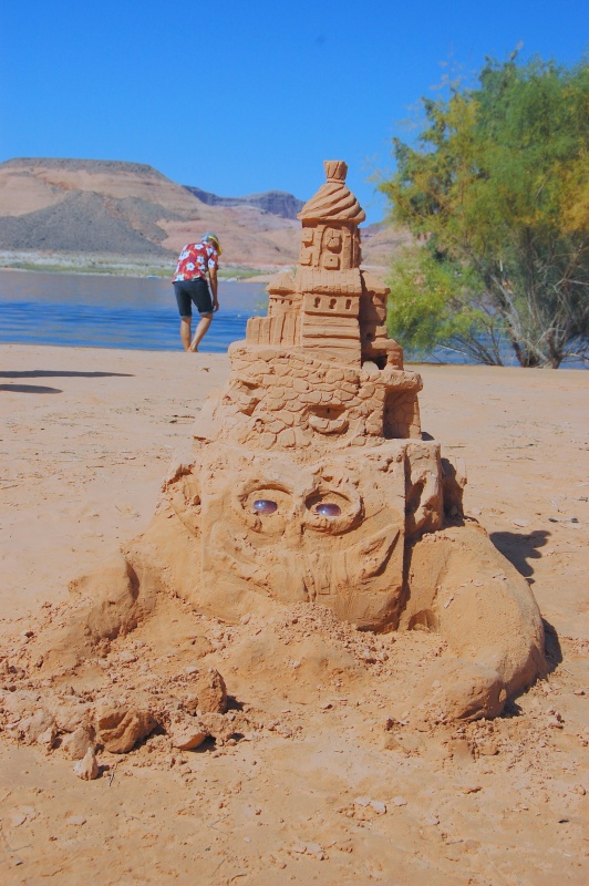 Sand sculpture found on beach.