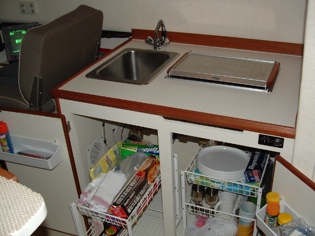 Scooter- storage under galley area