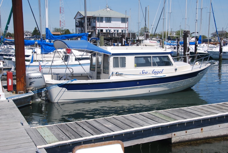 Sea Angel awaiting departure after a wonderful lunch and fellowship. We ate in the white building in the background.