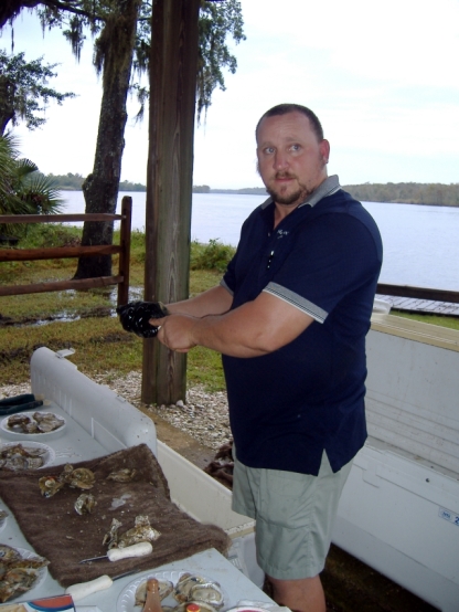Service to the End
 Shucking Oysters