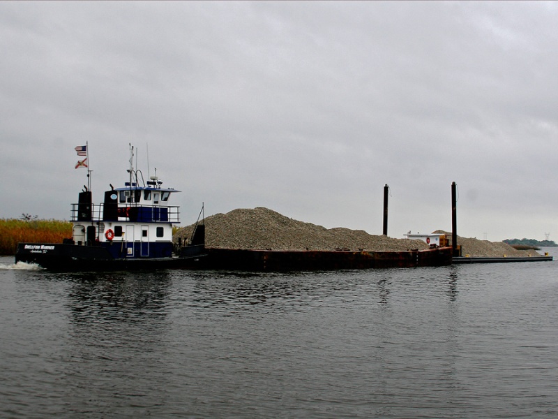 Shellfish Mariner Tug Loaded with 1000s of pounds of oyster shells headed out of Scipio Creek.