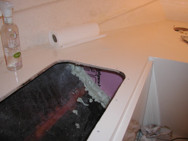 Shoved the front compartment full of foam and installed a pink foam bulkhead to hold it. I used some filler foam till the forward compartment was full. Note the 6" access I cut.