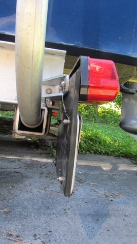 side view of finished project, note plastic backing plate in between the license plate and the conveyor belting