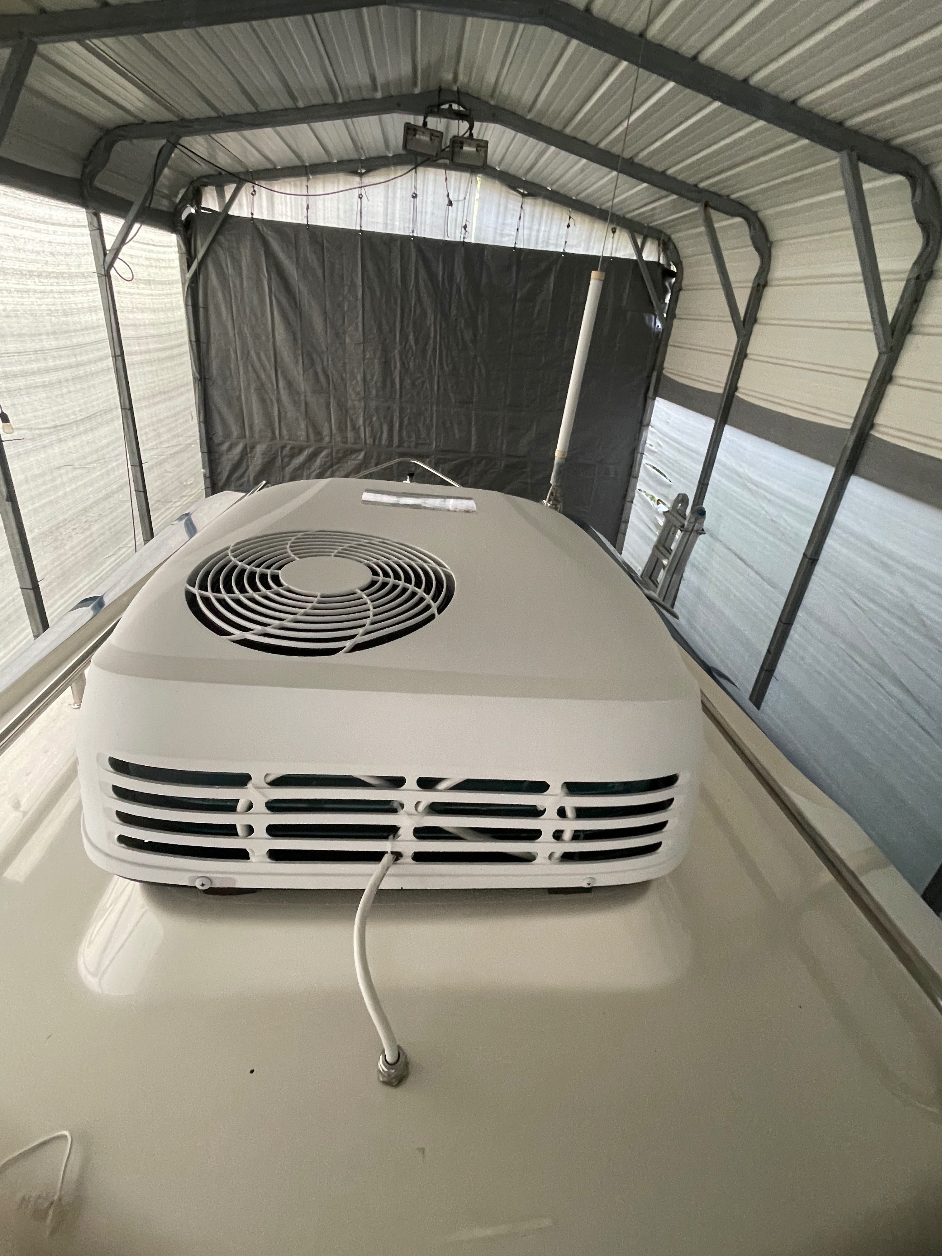 Slack loops in wire allows cover removal without disconnecting from unit