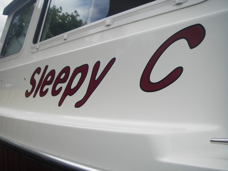 Sleepy C, portside name decal installed.  Font is "Epilog" and is 8" from top to bottom.  Big and simple enough and to read from a distance.