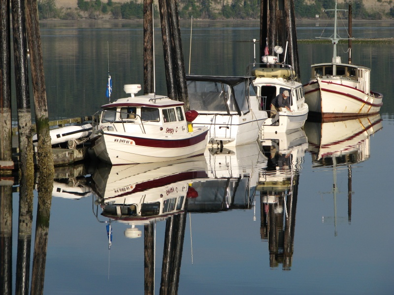 "SleepyC" and Friends at Mystery Bay SP 2009. Julie Anne, JC Lately, and a nice old wooden C-Dory wanna-beon a quiet warm morning.