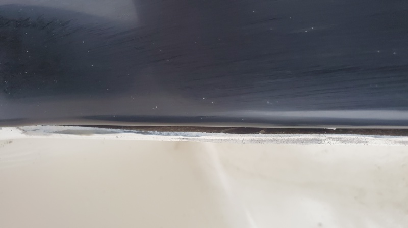 Slight delamination of the forward edge of the transom