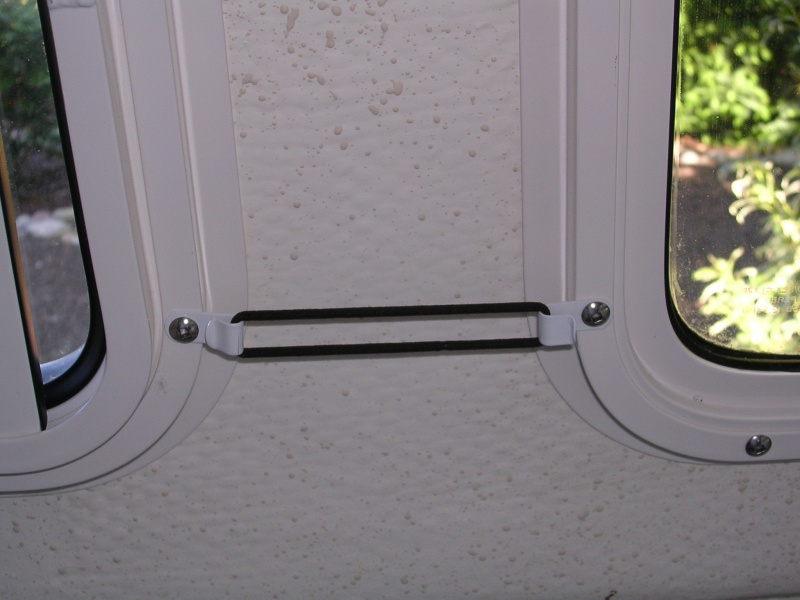 Small hair scrunchi used to hold curtains against cabin wall.