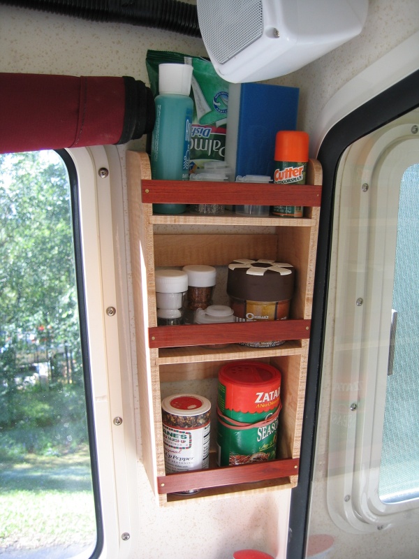 Spice/gear rack through-bolted on side into head/shower.