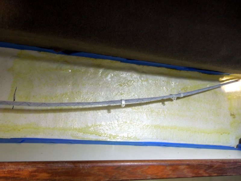 Spray on the adhesive, don?t get crazy.  Tune the can upside down and clean the spray nozzle after each application. As you can see my nozzle isn?t feathering well but worked out fine.