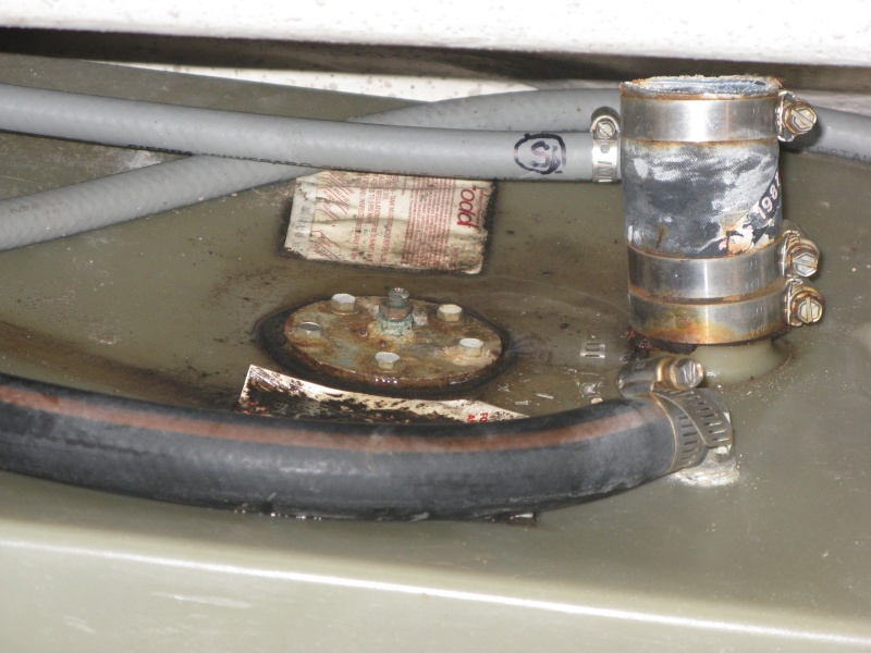 Starboard tank with concaved top...water sits around fuel gauge gasket