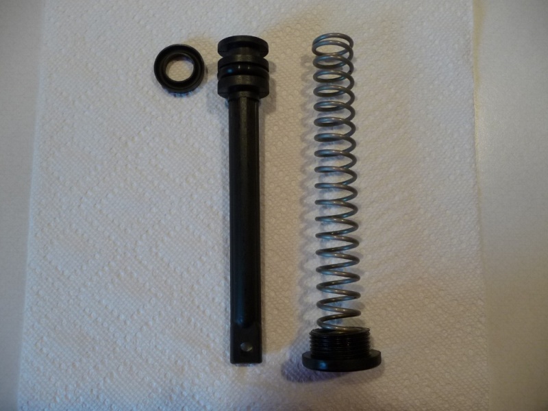 Step Four, pull out the actuator and remove the top seal.  Replace with a U-seal 0.75" x 1.25" x 0.25" 800 PSI.  The O-ring was in good shape and did not need replacing.