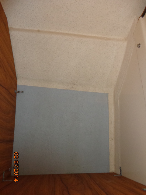 Storage area under front port seat.