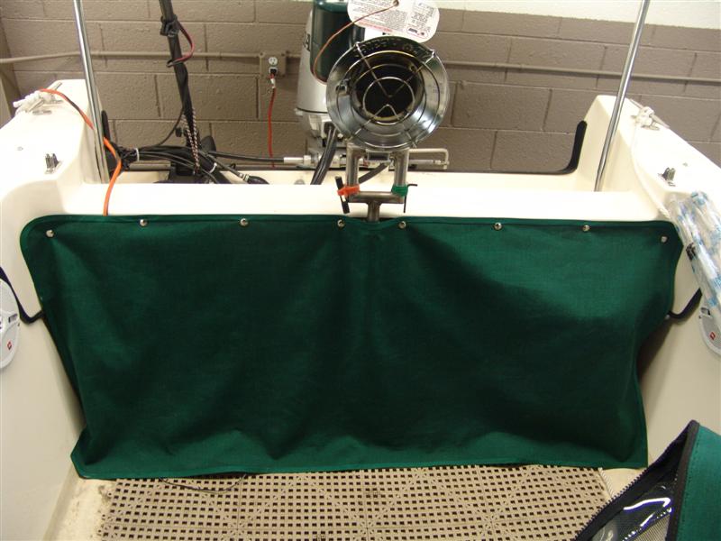 Sunbrella fabric with snaps and trim to clean up the back.