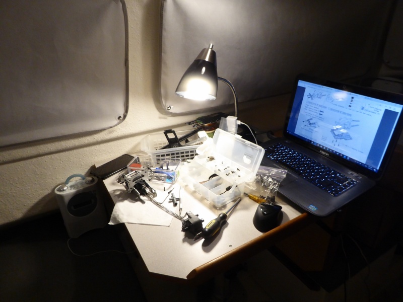 Sunday evening enjoying 3 hobbies at once - Seahawks on the radio, on the boat, while re-building a vintage RC car from the 1980s