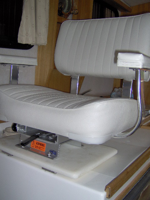 Swivels and slides, raises seat about 5 inches