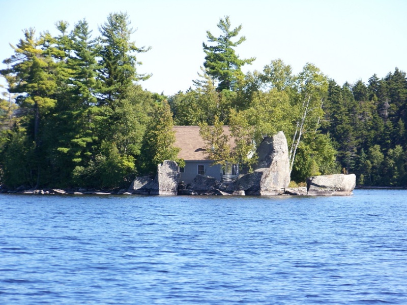 Talk about water front, this camp takes up the whole island. Obviously grandfathered out of today's set back codes.