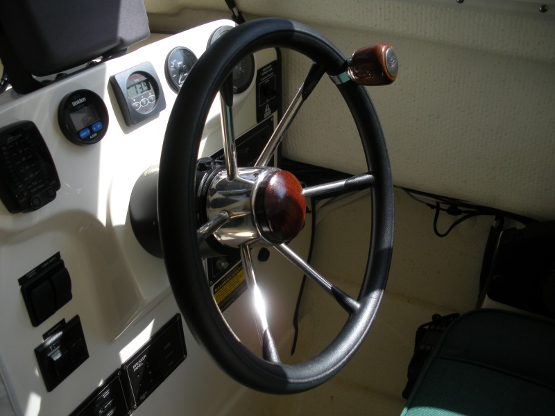 Teak steering wheel hub and spinner. "Suicide knob" for those chronologically gifted, like me.