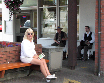 The Blonde listening to street musicians