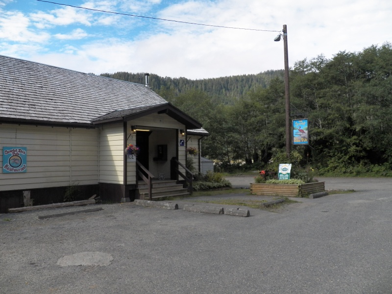 The first thing you will come to is the pub.  It has a land line.  No dial tone.