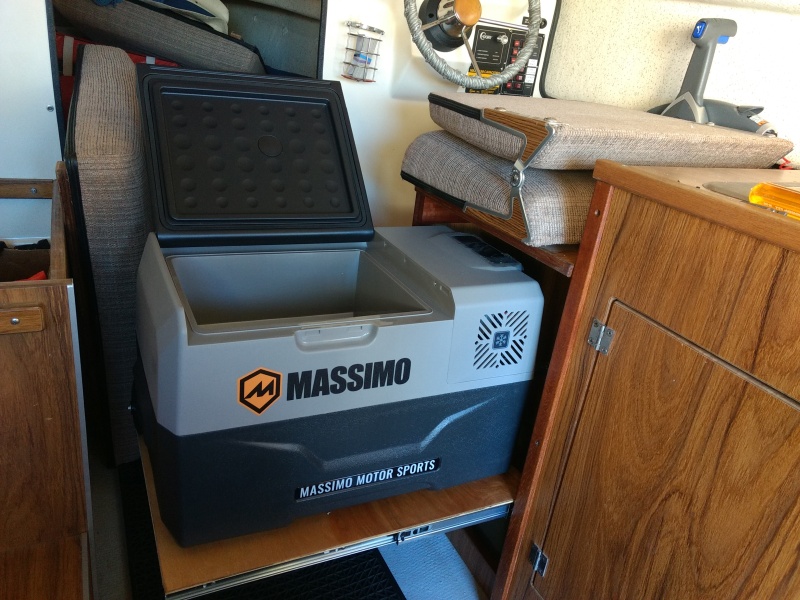 The fridge is 32 quart, 12v/AC LG compressor unit from Costco. I've been running it full of beer in one of the spare bedrooms for the past month and it seems to work really well. Supposedly 2.4 amp draw when running. Runs for about 5 minutes on a 25 minute cycle. I found out about them from the guys on the Expedition Portal forum. They seem to like them pretty well so we'll see how it goes. 

For $250 I figure it's definitely worth a shot compared to the price of some of the "name" brand units out there. If it sucks, back to Costco it goes.

I'll be adding a 150 watt solar panel to the roof rack to keep it chugging along.