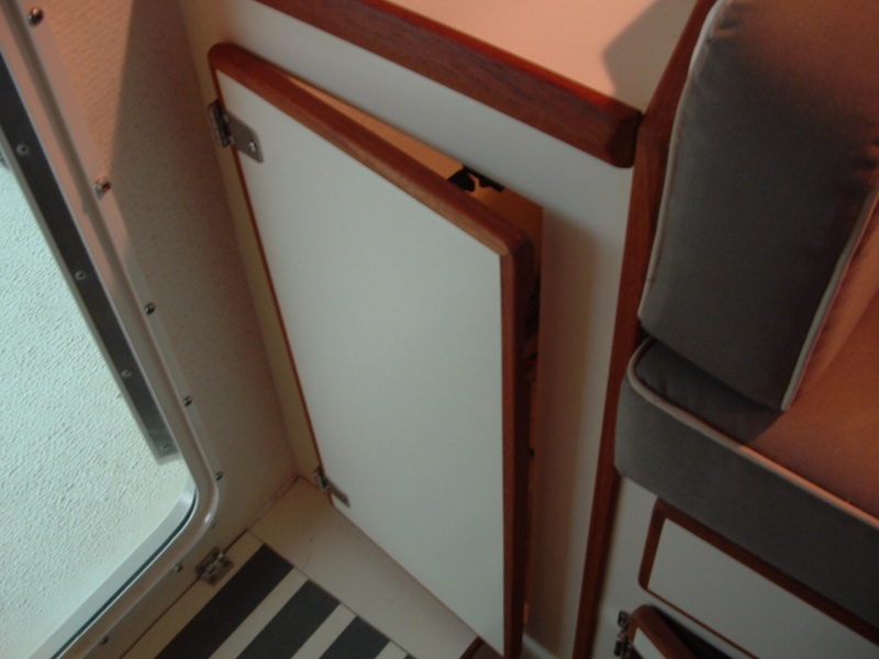 The hanging locker that wasn't tall enough to hang clothes in.