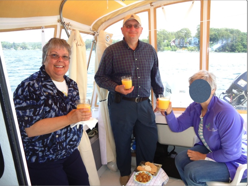 The Marinaut 215 cockpit has plenty of space for entertaining guests.  We had 4 people in the cockpit enjoying Mimosa's and cheese while anchored (with anchor dragging) on the Niantic River in Niantic, CT.  To give one an example of scale, I'm 6 feet 250 lbs.