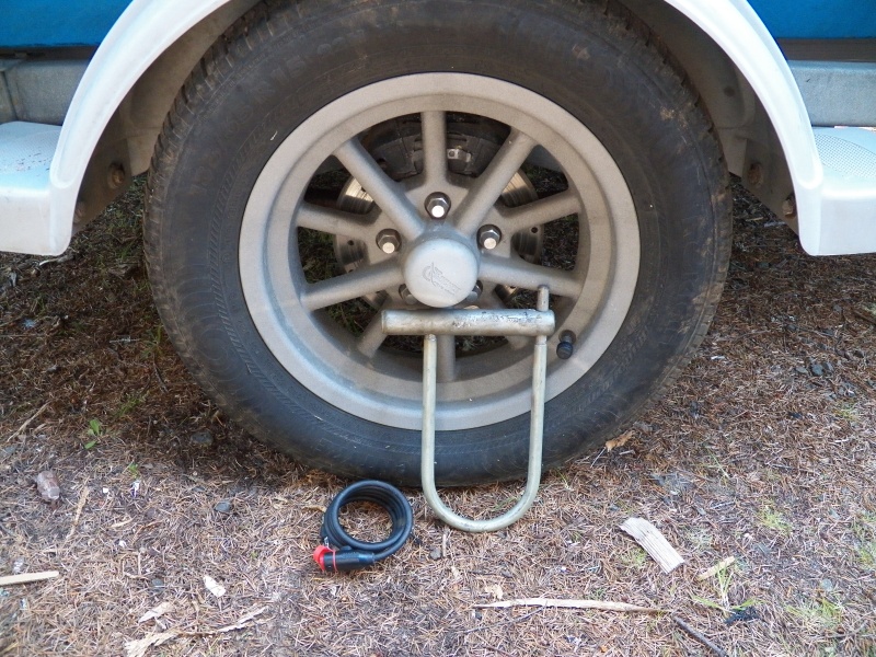 The new 15" tires had to be really skinny to fit the original fenders.  These aluminum "gasser" wheels fit the bill and are rough cast so the look fine after saltwater dunks.  I lock them to the springs if the trailer is left in an unsecured area.