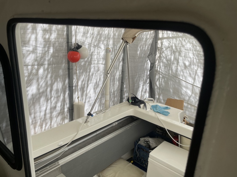 THE PROBLEM: It\'s large milk crate was taking up almost all the starboard aft storage area.  I bought a vertical mount that didn\'t fit, so I made this one.