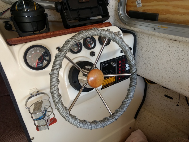 Then I pulled this destroyer wheel from the fishing boat, wrapped it with some 550 Paracord, and installed it in the Dory. Nice little update from the "vintage" plastic wheel.