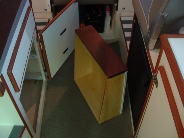 There was room for two drawers (depth was about 6" front to 8 1/2" rear).