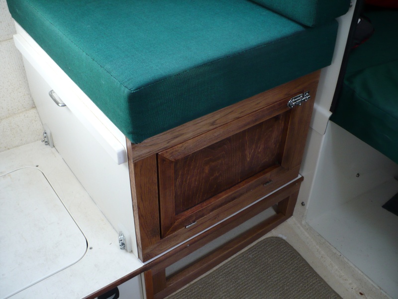 These are Sea Dog slide bolts that hold the box in position. 2 holes drilled in floor.