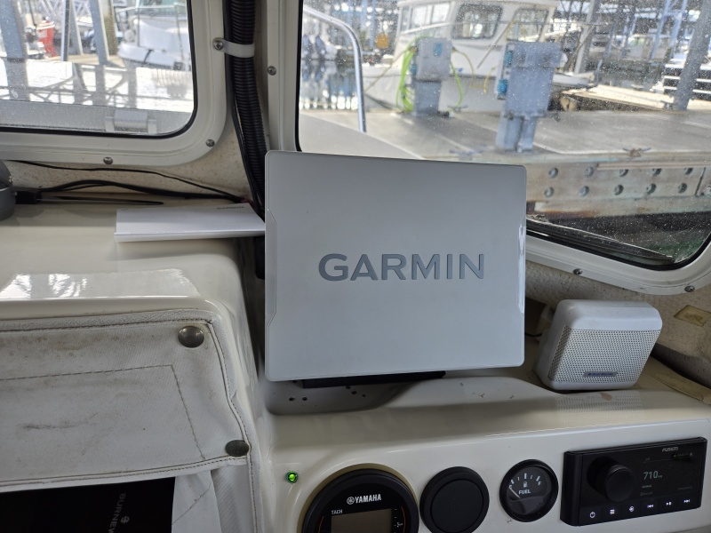 This Garmin unit interfaces with the VHF radio and fusion stereo