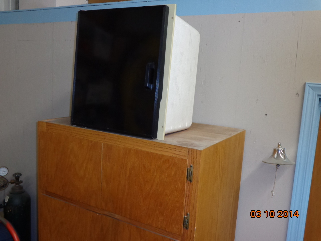 This ice box was removed from under the helm seat. 
For Sale, make offer.