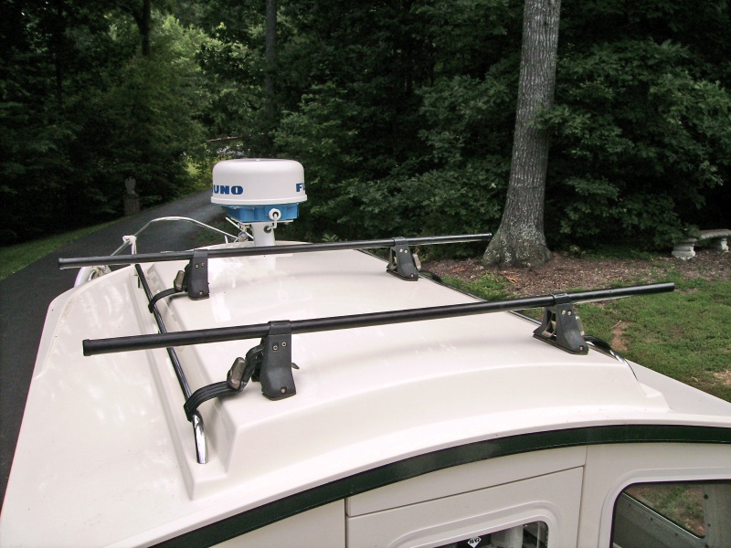 This is a gutter mount Yakima rack that I had hidden in the garage.  It came off an old Isuzu Trooper.  The main bracket has padded rubber on the bottom and the metal brace is mar free as well.  Snug secure fit.